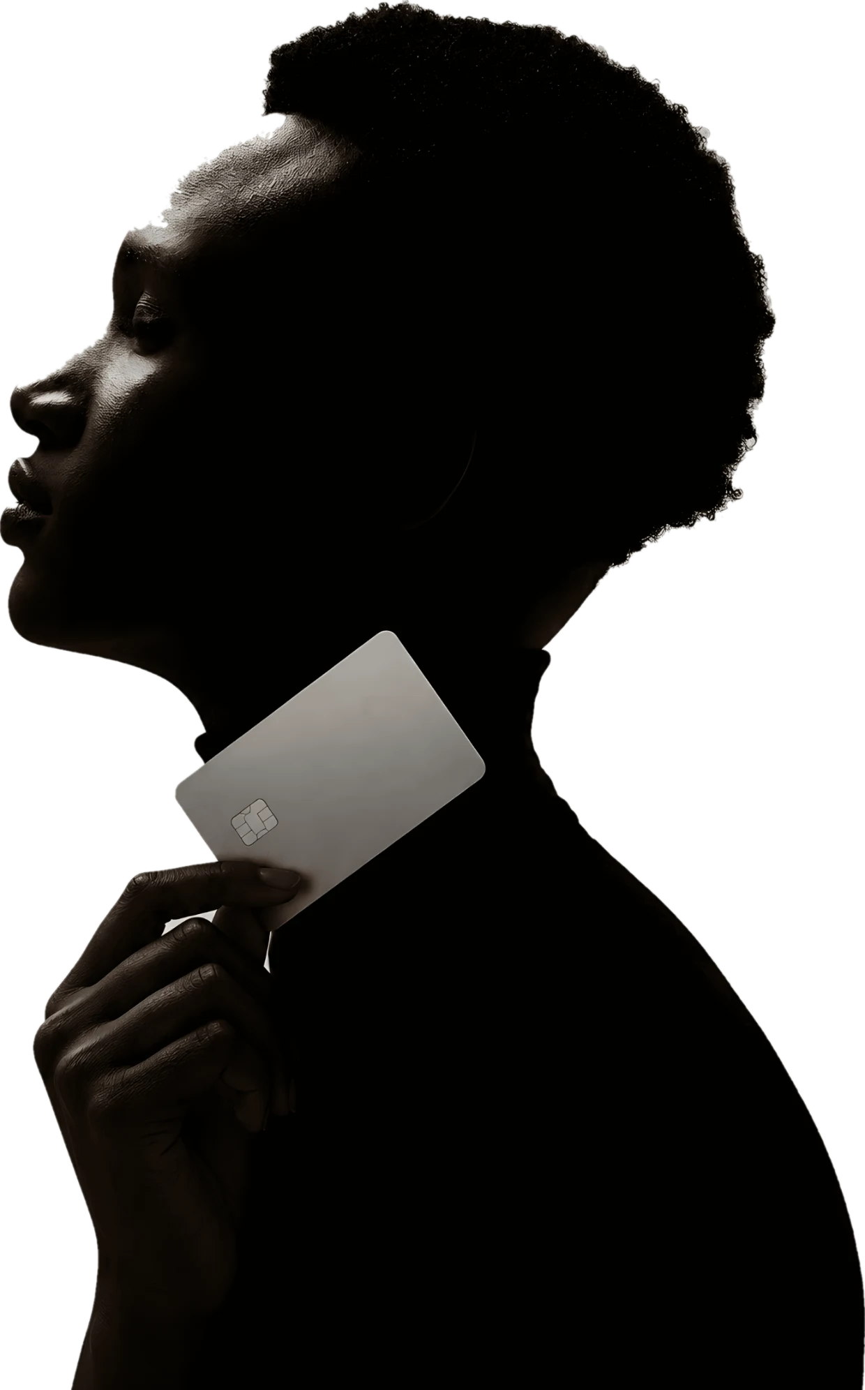 A person in silhouette holding a payment card